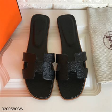 black hermes slides|hermes jelly flat sandals.